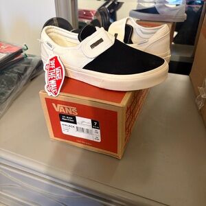 Vans Black and Cream Slip-On Shoes